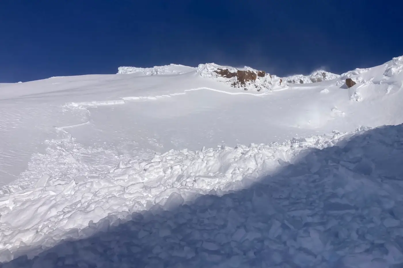 Avalanche crown and debris field on Glacier Knob near Mount Ruapehu, New Zealand, where ski tourers were partially buried in a backcountry slide. Avalanche crown and debris field on Glacier Knob near Mount Ruapehu, New Zealand, where ski tourers were partially buried in a backcountry slide.